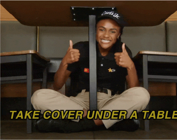 Take cover under a table